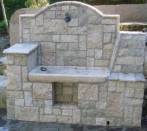 Fountain in draft of travertine